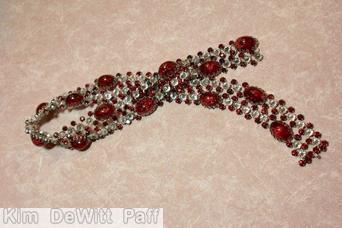 Schreiner 2 row wide belt 15 large oval cab inverted stone ruby dragon breath large oval cab crystal inverted stone ruby chaton silvertone jewelry