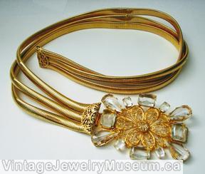 Schreiner large rectangle buckle 6 leaf filigree large faceted surrounding stone 4 large faceted teardrop 4 large faceted emerald cut goldtone crystal faceted jewelry