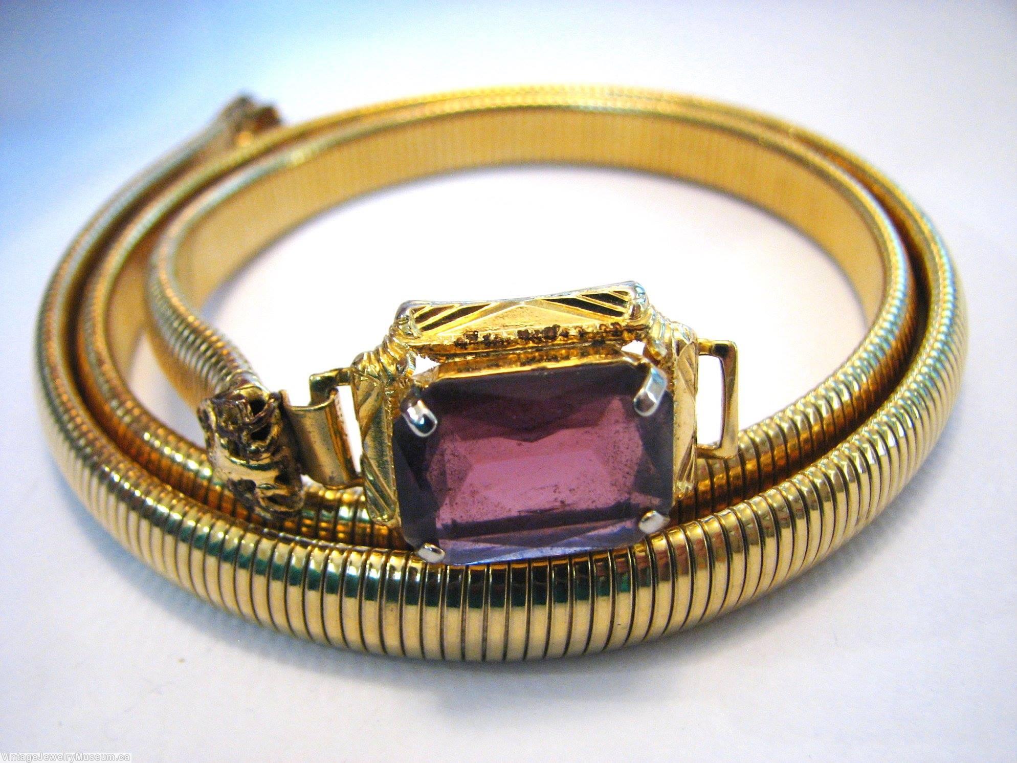 Schreiner one large rectangle faceted open back emerald cut purple goldtone jewelry