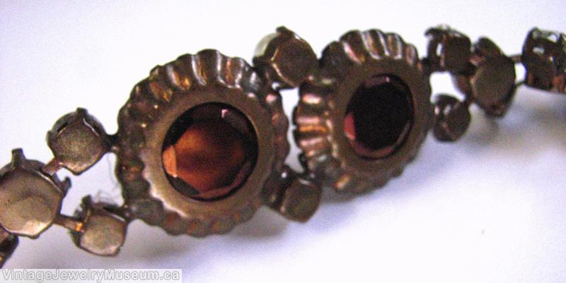 Schreiner twin disc and inverted stones metalic browns crystal inverted copper back jewelry