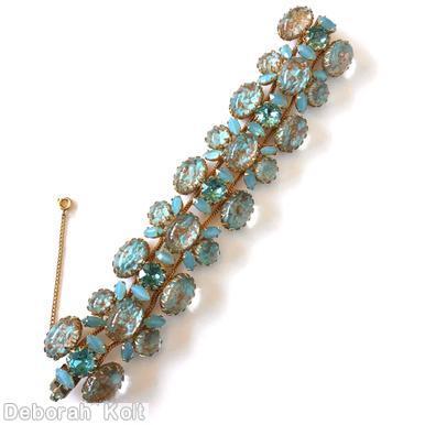 Schreiner 2 strand 4 large oval cab 5 small chaton 10 small navette center row 5 large oval cab side row aqua venetian glass oval cab moonglow aqua small navette goldtone jewelry