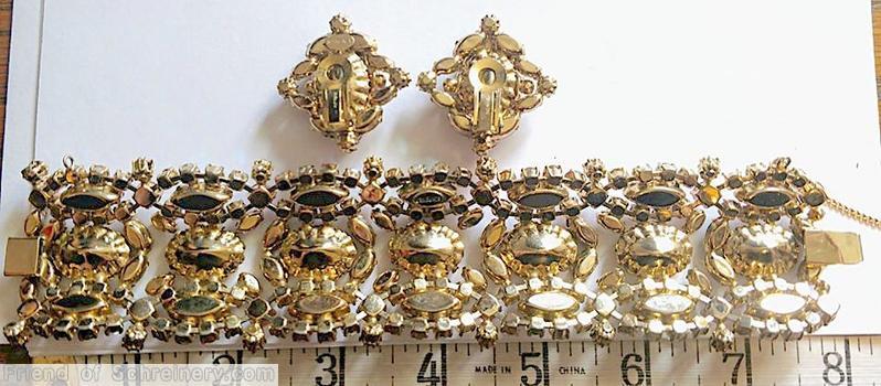 Schreiner 3 row wide bracelet 7 large oval faceted stone navette surrounded by chaton topaz large oval stone moonglow pink small chaton metalic gold navette pink topaz navette goldtone jewelry