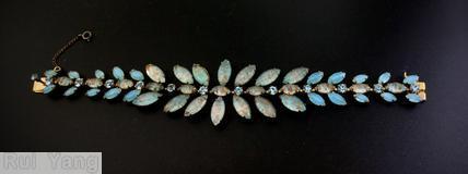 Schreiner single chain of small navette chaton varied size radial navette aqua venetian aqua goldtone jewelry