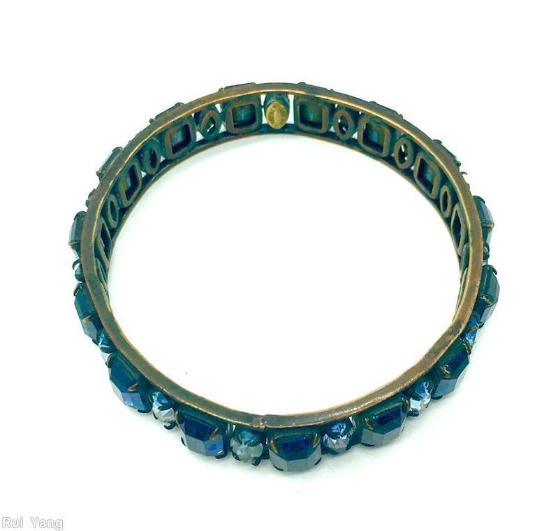 Schreiner single row of 15 large emerald cut bangle 15 navette copper back copper marina blue faceted emerald cut ice blue faceted navette jewelry