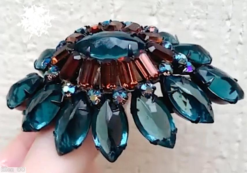 Schreiner 12 navette side domed oval pin 12 small baguette surrounding oval center smoky blue large faceted oval stone brown metalic faceted baguette large oval faceted aqua center gunmetal jewelry