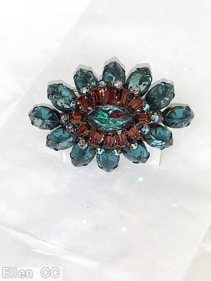 Schreiner 12 navette side domed oval pin 12 small baguette surrounding oval center smoky blue large faceted oval stone brown metalic faceted baguette large oval faceted aqua center gunmetal jewelry