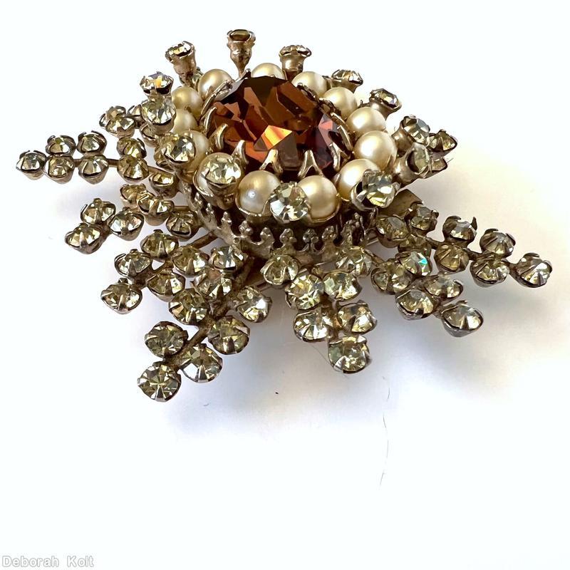 Schreiner 12 varied length branch snowflake pin large oval center 12 surrounding stone 12 surrounding metalic colored faux pearl large faceted oval topaz center clear champagne chaton goldtone jewelry