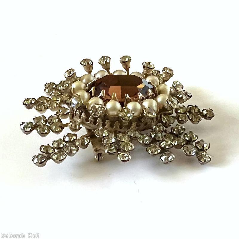 Schreiner 12 varied length branch snowflake pin large oval center 12 surrounding stone 12 surrounding metalic colored faux pearl large faceted oval topaz center clear champagne chaton goldtone jewelry
