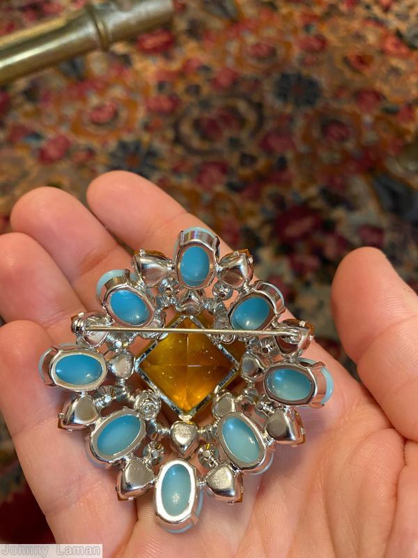 Schreiner 16 heart stone large faceted crystal center domed rectangle pin 8 oval cab 2 rounds surrounding 8 groups of 2 small chaton topaz large hexagon faceted open back center stone ice blue heart stone baby blue large oval cab topaz small heart stone silvertone jewelry