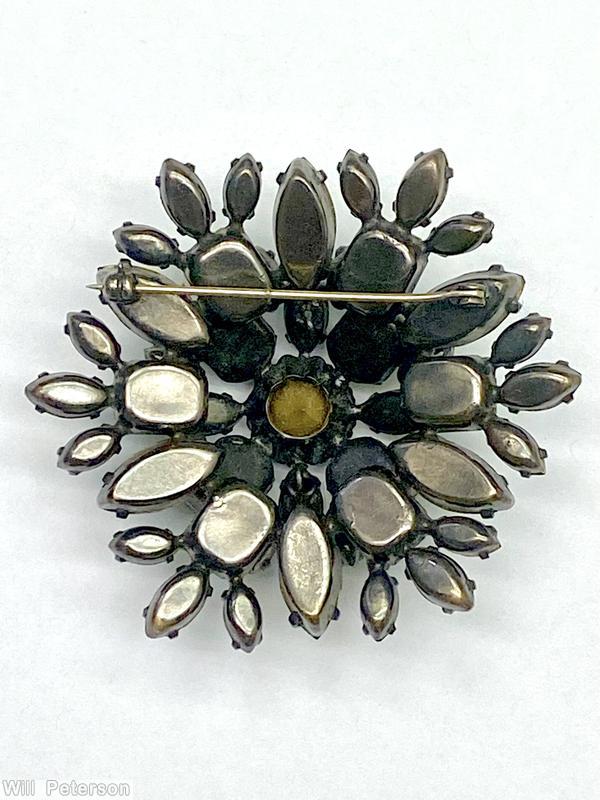 Schreiner 2 level domed radial pin top leve 4 emerald cut 4 navette chatton center bottom level 6 large navette 6 emerald cut ice blue emerald jewelry