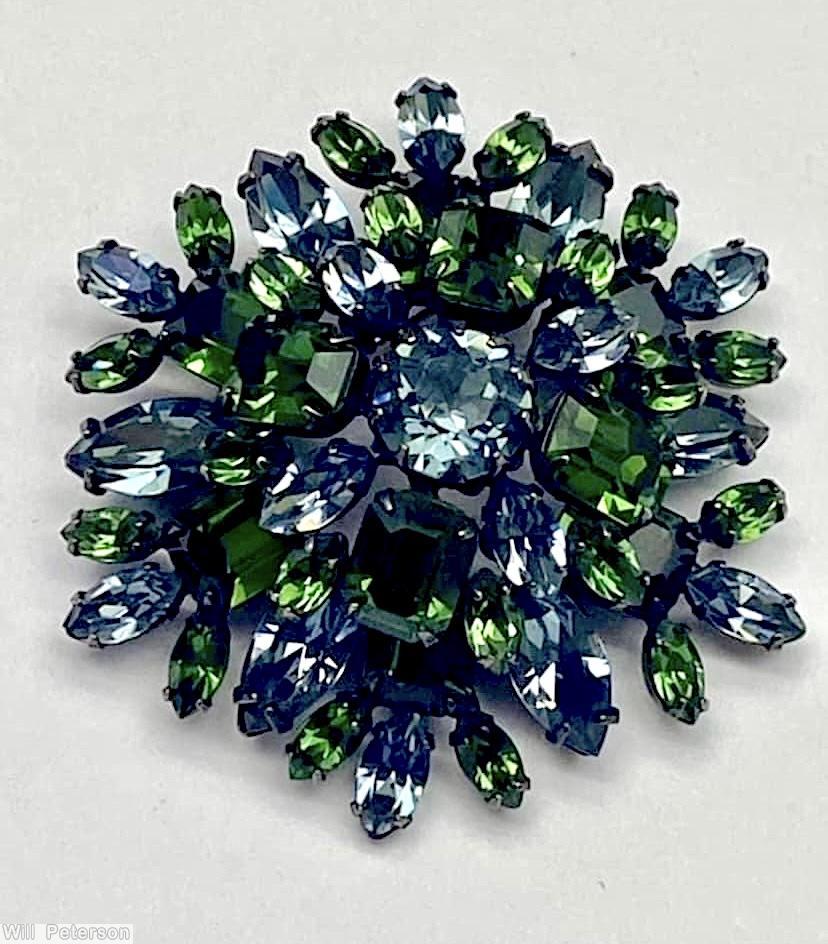 Schreiner 2 level domed radial pin top leve 4 emerald cut 4 navette chatton center bottom level 6 large navette 6 emerald cut ice blue emerald jewelry