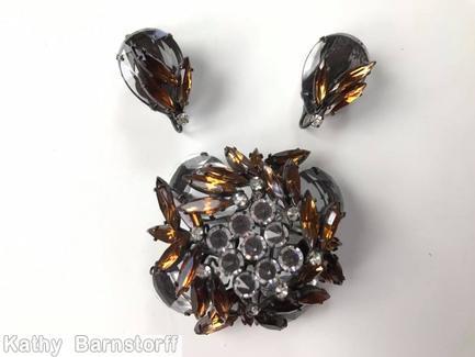 Schreiner 2 level domed square pin 4 large teardrop corner stone 9 inverted center stone random arranged navette surrounding brown crystal jewelry