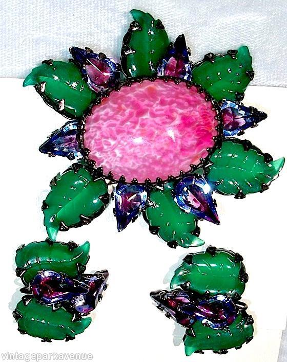 Schreiner 2 level radial 6 carved leaf pin large oval cab center top 6 surrounding teardrop green carved leaf stone fuschia marbled large oval cab center bicolor ruby blue faceted large teardrop jewelry