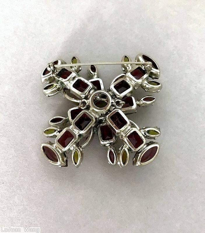 Schreiner 2 level radial cross pin top level chaton center 4 emerald cut 4 navette surrounding bottom 4 emerald cut 12 navette lavender peridot jewelry