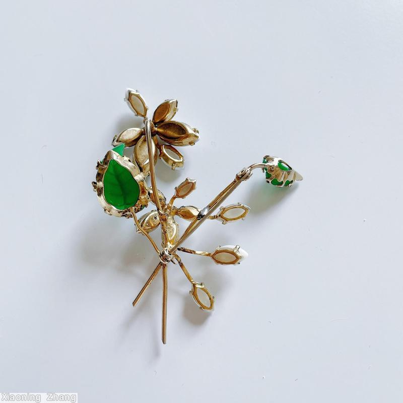 Schreiner 2 trembler flower 2 carved leaf pin milk white navette crystal navette green carved leaf goldtone jewelry