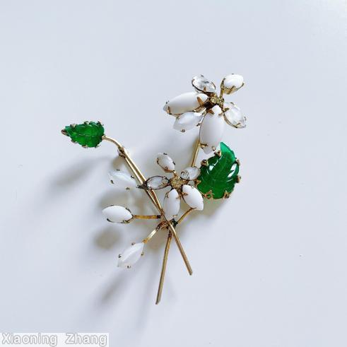 Schreiner 2 trembler flower 2 carved leaf pin milk white navette crystal navette green carved leaf goldtone jewelry