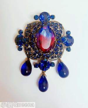Schreiner 3 dangle top down pin large oval cab center top surrounding 3 round small stone in 4 wired pedal 4 large chaton large bicolor ruby navy faceted oval stone center royal blue goldtone jewelry
