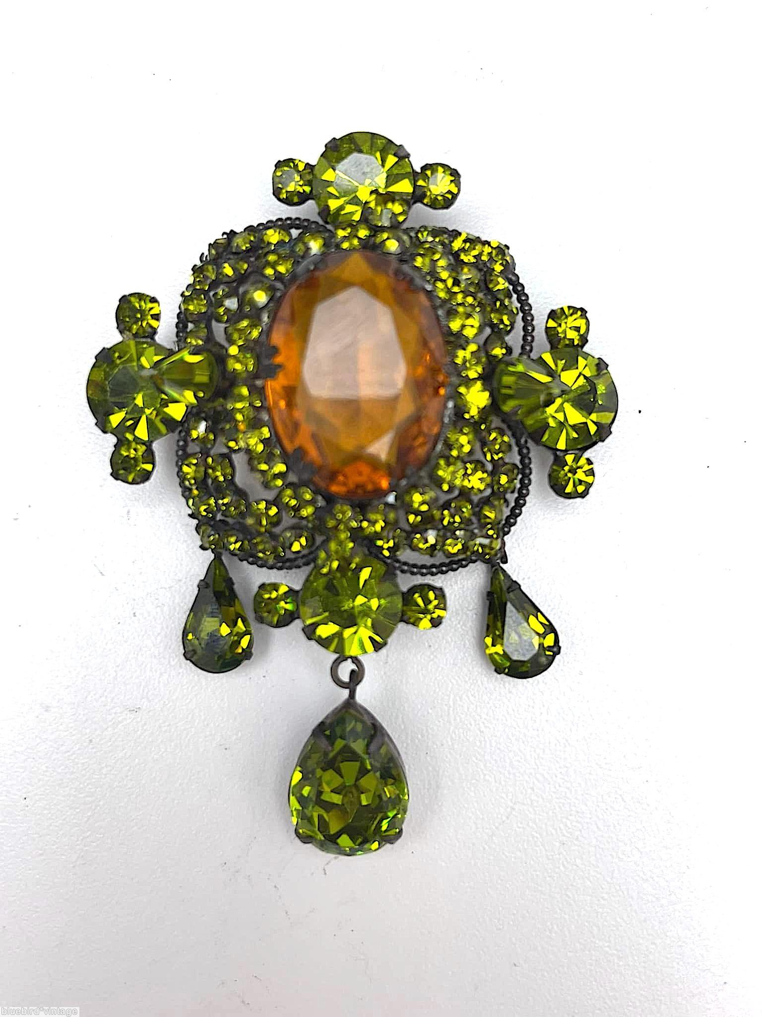 Schreiner 3 dangle top down pin large oval cab center top surrounding 3 round small stone in 4 wired pedal 4 large chaton large oval faceted topaz center neon peridot jewelry