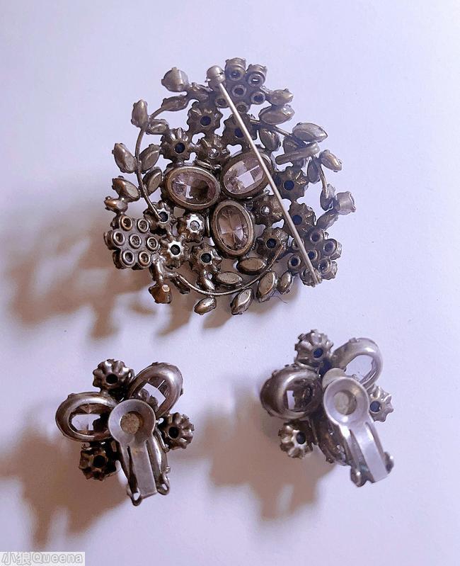 Schreiner 3 floral branch domed radial triangle pin 3 clustered flower 3 large oval stone matte blue chaton pale lavender faceted oval stone ice blue small chaton silvertone jewelry