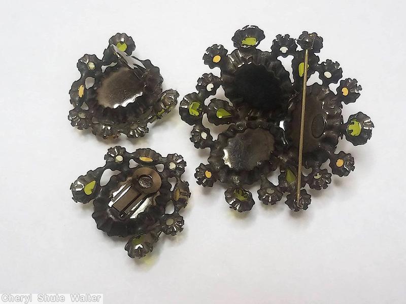 Schreiner 3 large oval cab domed radial triangle pretzel pin small stone center bordered marbled green peridot amber crystal gunmetal back jewelry
