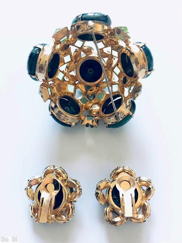 Schreiner 3 rounds domed radial pin 6 large round art glass stone 8 surrounding tilted navette 2nd round 10 faceted square stone side wall 5 large round stone marbled green large round cab celery faceted square stone blue small faceted navette goldtone jewelry