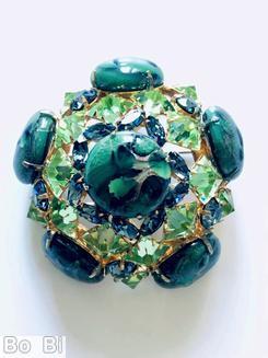 Schreiner 3 rounds domed radial pin 6 large round art glass stone 8 surrounding tilted navette 2nd round 10 faceted square stone side wall 5 large round stone marbled green large round cab celery faceted square stone blue small faceted navette goldtone jewelry