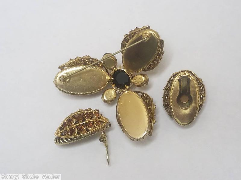 Schreiner 3 wired seeds covered large oval cab triangle radial pin large chaton center clear brown crystal jet goldtone jewelry