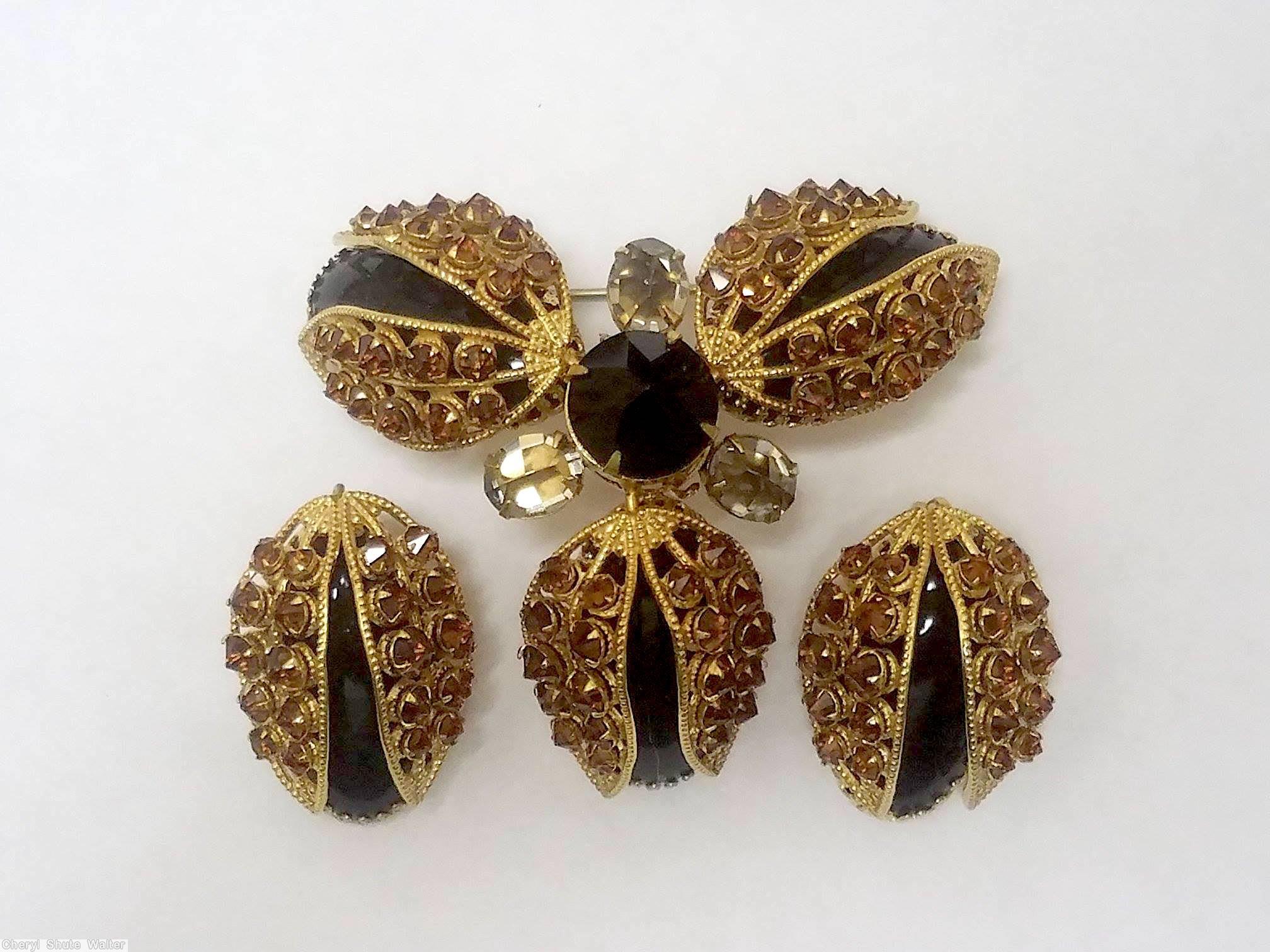 Schreiner 3 wired seeds covered large oval cab triangle radial pin large chaton center clear brown crystal jet goldtone jewelry