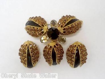 Schreiner 3 wired seeds covered large oval cab triangle radial pin large chaton center clear brown crystal jet goldtone jewelry