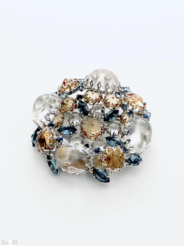 Schreiner 4 large oval stone 4 large round stone wall concave round stone center 5 small chaton surrounding 5 navette large crystal round cab topaz large inverted pointy stone smoky blue faceted small navette silvertone jewelry