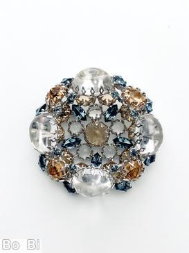 Schreiner 4 large oval stone 4 large round stone wall concave round stone center 5 small chaton surrounding 5 navette large crystal round cab topaz large inverted pointy stone smoky blue faceted small navette silvertone jewelry