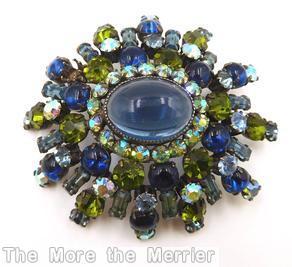 Schreiner 5 rounds varied length domed radial oval pin large oval center 16 small surrounding chaton small baguette pale navy peridot ab smoky blue smoke jewelry