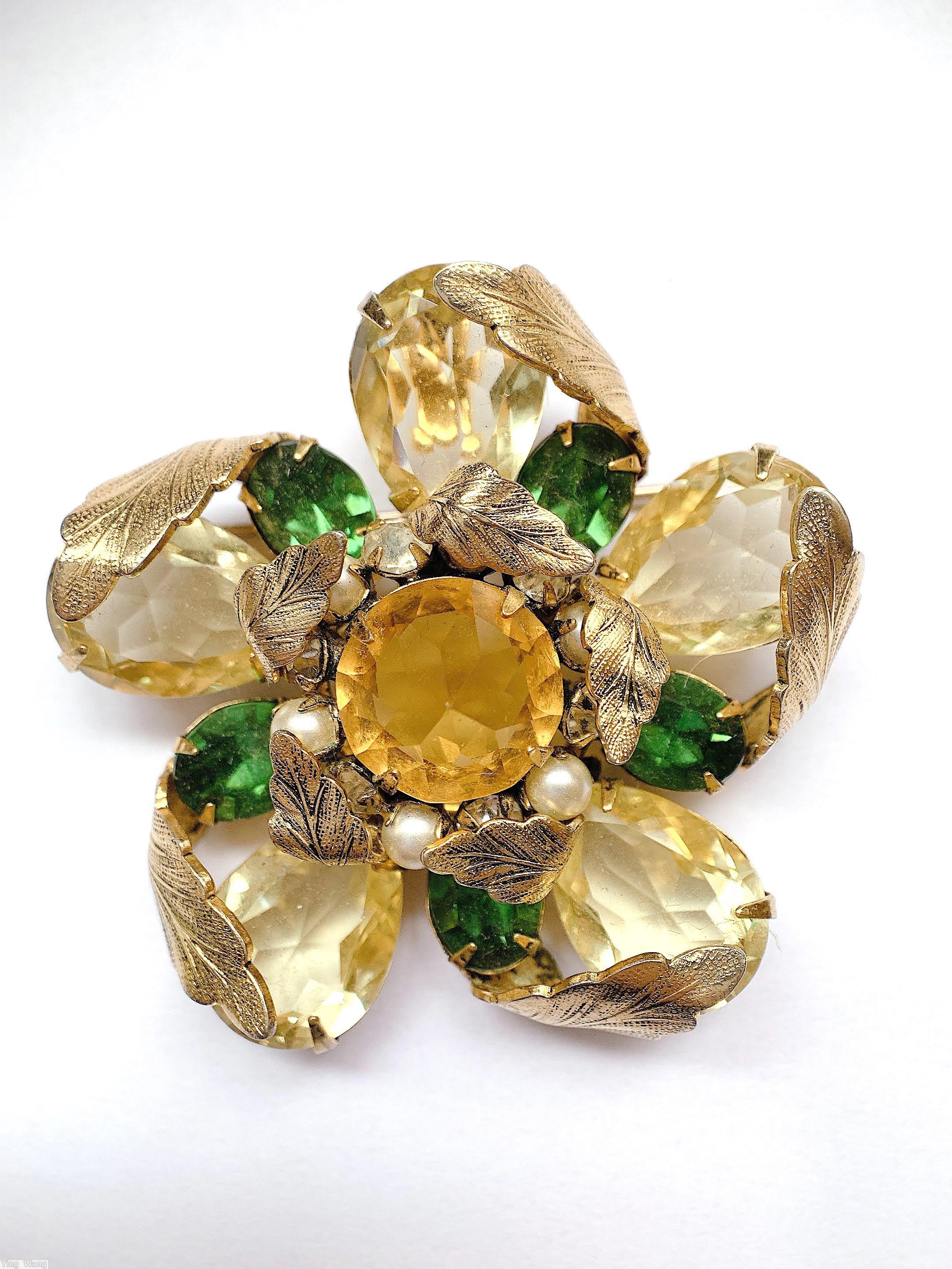 Schreiner 5 teardrop radial flower pin 10 folded metal leaf 5 small oval stone 12 surrounding stone large round center stone clear champgne large faceted teardrop green oval faceted stone amber faceted large round center faux pearl goldtone jewelry