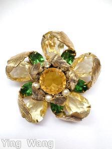 Schreiner 5 teardrop radial flower pin 10 folded metal leaf 5 small oval stone 12 surrounding stone large round center stone clear champgne large faceted teardrop green oval faceted stone amber faceted large round center faux pearl goldtone jewelry