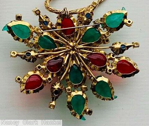 Schreiner 7 carved leaf 2 level radial pin top level 6 teardrop bottom level 5 large teardrop cab 5 small teardrop green carved leaf ruby navy faux pearl crystal goldtone jewelry