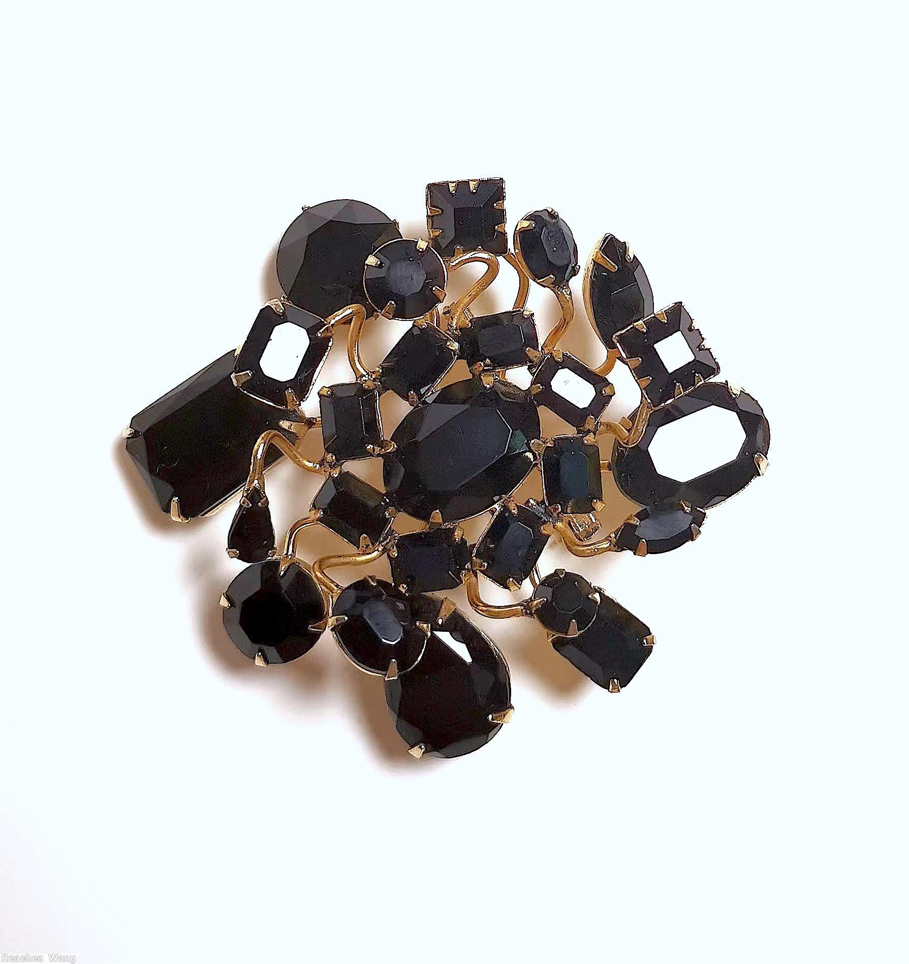 Schreiner 8 sprawling branch sprawling radial pin large oval center stone 8 surrounding emerald cut large teadrop large oval stone large round stone jet goldtone jewelry