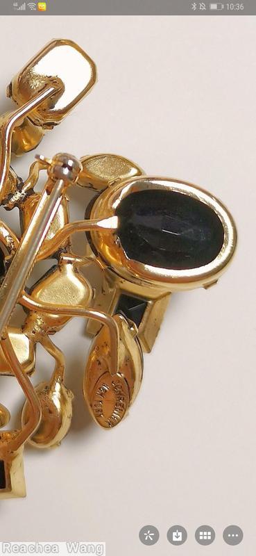 Schreiner 8 sprawling branch sprawling radial pin large oval center stone 8 surrounding emerald cut large teadrop large oval stone large round stone jet goldtone jewelry