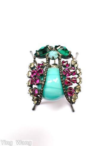 Schreiner abstract bug 4 leg 2 seeds wired wing large round cab body 2 large eye inverted fuschia clear champgne green turquoise marbled aqua large round cab jewelry