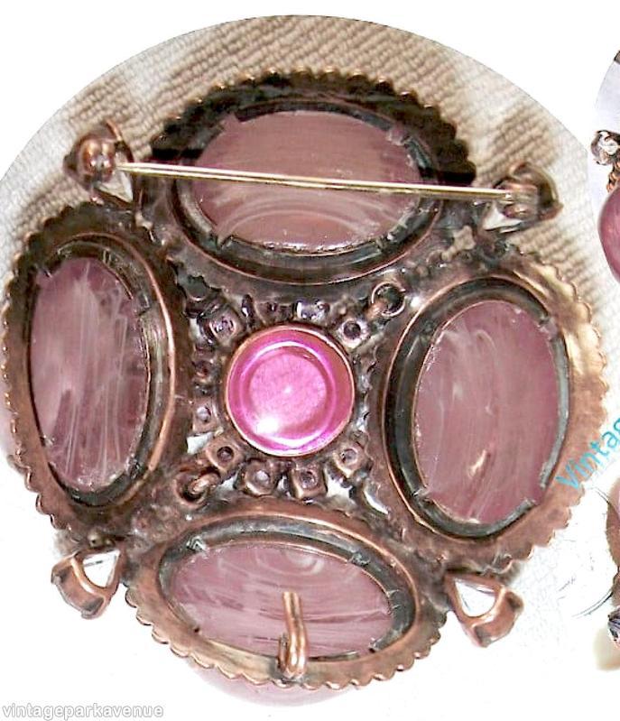 Schreiner domed 4 large oval cab sided 1 large chaton center pin 12 surrounding small chaton 4 small teardrop marbled lavender large oval cab ice pink inverted small stone fuschia large round cab center crystal teardrop copper back jewelry
