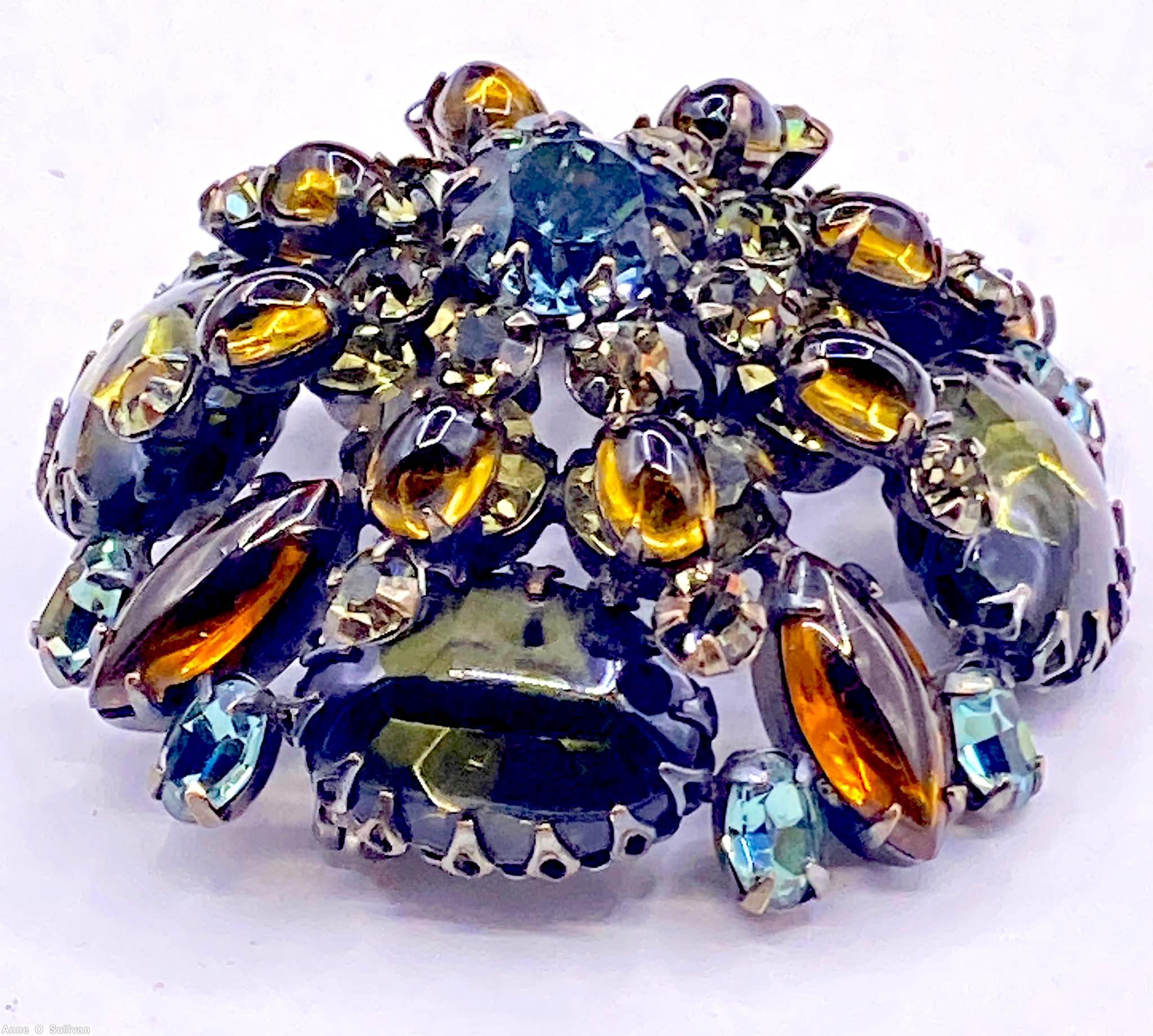 Schreiner domed 4 large oval radial pin 3 rounds 6 surrounding small chaton center chaton 6 small oval stone 4 large navette clear blue center chaton topaz large navette dark olivine large oval cabochon amber small oval cabochon jewelry