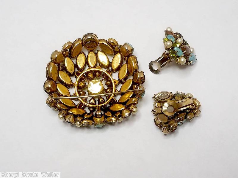 Schreiner domed radial flat top round pin chaton center 12 surrounding small navette gold fluss brown turquoise peridot faux pearl seeds jewelry