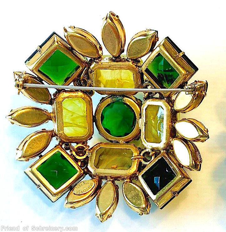 Schreiner domed radial square pin 4 large square corner stone 4 large emerald cut side large chaton center marbled yellow emerald cut green open back large faceted round cab center matte dark green chaton crystal ab emerald goldtone jewelry