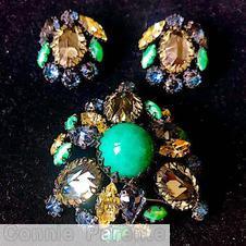 Schreiner domed radial triangle pin 3 large teardrop large chaton center 4 navette 4 small teardrop clear champgne faceted large teardrop large green chaton center ice blue jewelry