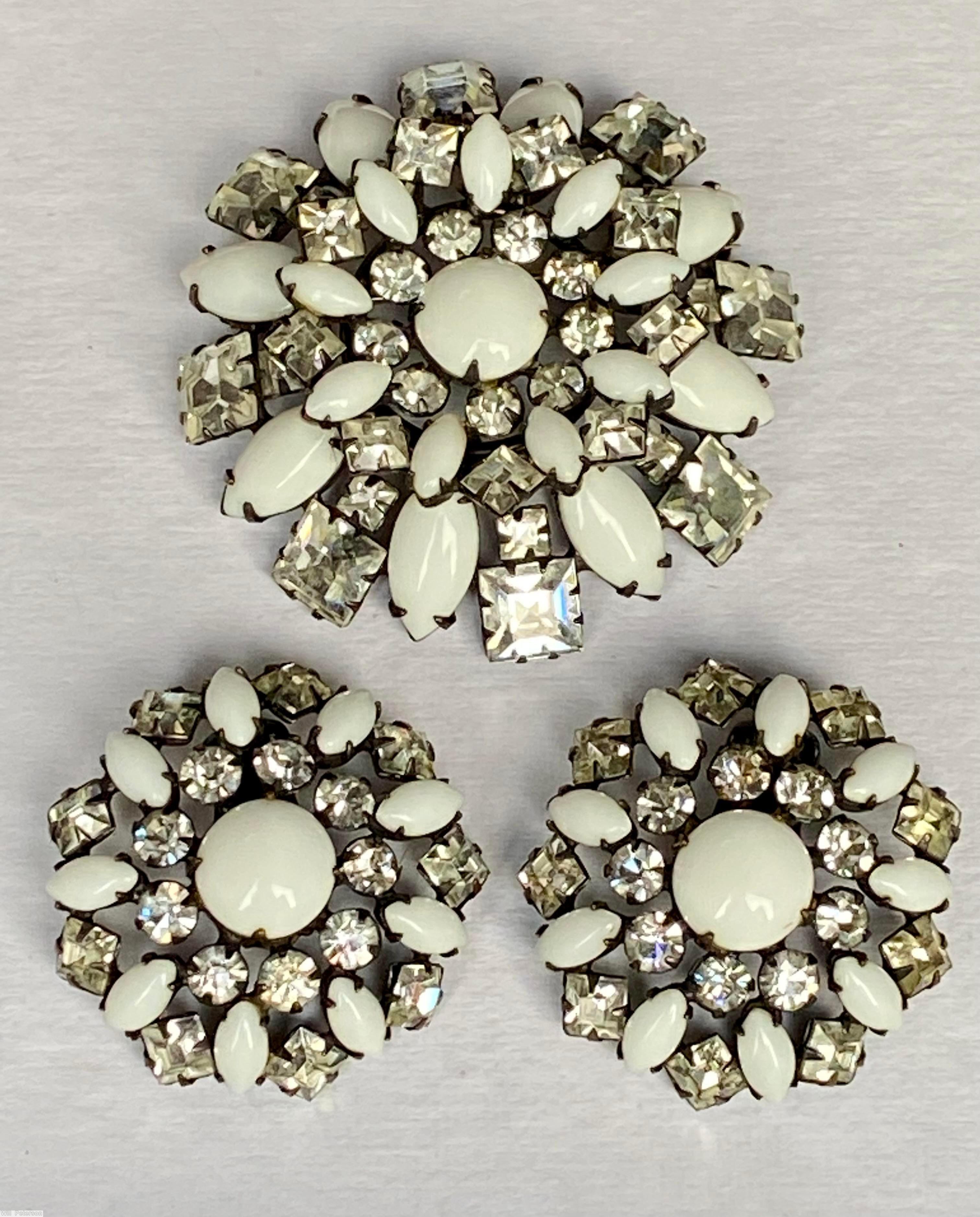 Schreiner domed round raditing pin 3 rounds round cabochon center 9 surrounding small chaton 9 small navette 9 small square 8 navette 8 square milk white crystal jewelry