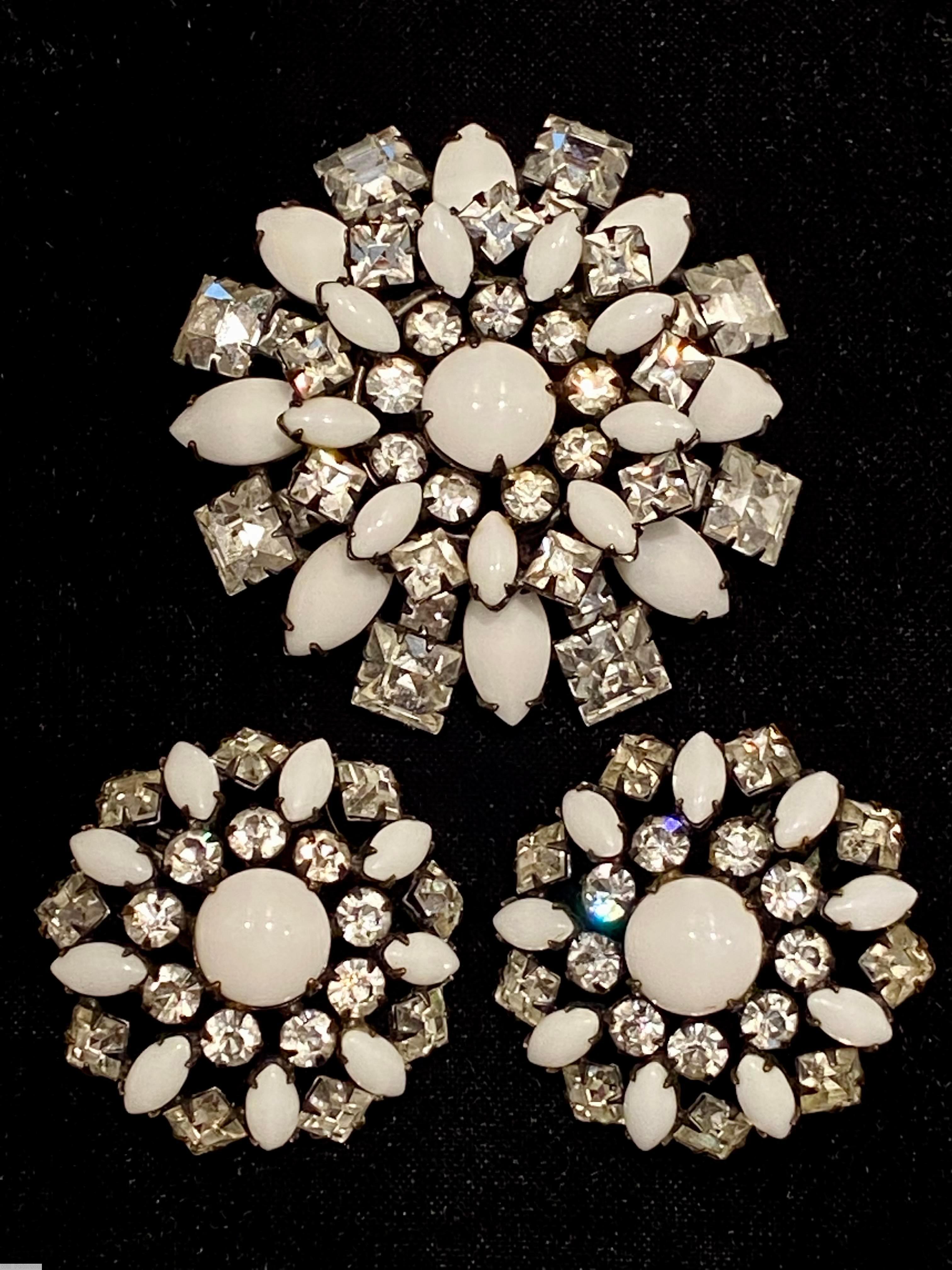 Schreiner domed round raditing pin 3 rounds round cabochon center 9 surrounding small chaton 9 small navette 9 small square 8 navette 8 square milk white crystal jewelry