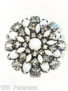 Schreiner domed round raditing pin 3 rounds round cabochon center 9 surrounding small chaton 9 small navette 9 small square 8 navette 8 square milk white crystal jewelry