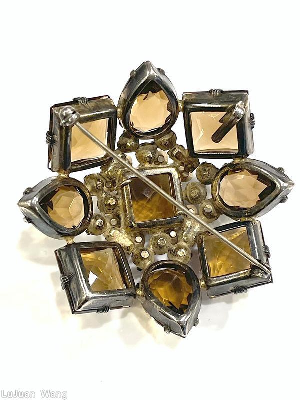 Schreiner domed square pin large faceted square center stone 4 large square faceted corner stone 4 large teardrop topaz large square faceted stone brown metalic large faceted teardrop smoky small chaton ruby small chaton jewelry