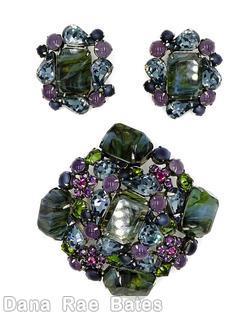 Schreiner domed square shaped pin with 5 large marbled emerald cut stone 4 surrounding teardrop 4 surrounding small chaton black marbled green emerald cut lavender green ice blue pink moonglow navy jewelry