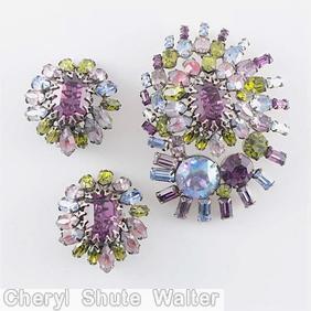 Schreiner eccentric 3 round swirled radial pin 1 large oval cab 1 large chaton 3 rounds surrounding bicolor white pink purple large oval center ab large chaton crystal purple peridot ice blue jewelry