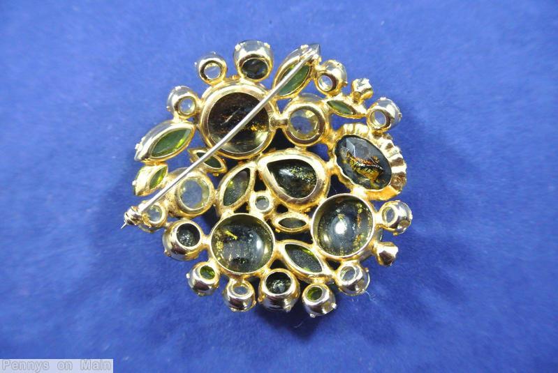 Schreiner end of day domed round pin gold fluss dark green peridot crystal jewelry
